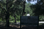 Shady View of of Sign in Front of Sandy Island School (now Sandy Island Community Center) by The Athenaeum Press
