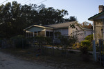 Onethia Elliott's Home and Front Yard at Sunset by The Athenaeum Press