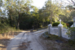 Sandy Road and a White Picket Fence by The Athenaeum Press
