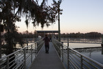 Brooks Leibee Walking to Eric Crawford and Alli Crandell on the Docks by The Athenaeum Press