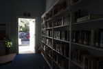 Bookcases and Open Door at Sandy Island School by The Athenaeum Press