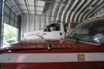 Sandy Island Volunteer Fire Trucks, Side Profile by The Athenaeum Press