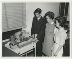 Conway Hospital Clerks looking at a new machine (Thala Terry and Sarah Parker) by Lonnie W. Fleming Sr.