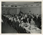 Attendees of a Christmas Party (Jamie Faye Black and Alec Black) by Lonnie W. Fleming Sr.