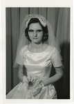 A young Caucasian lady in her wedding gown by Lonnie W. Fleming Sr.