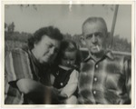 A photo of a man and woman with a child by Lonnie W. Fleming Sr.