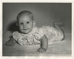 Photo of a baby crawling on carpet by Lonnie W. Fleming Sr.