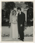 Bride and groom looking at each other and smiling by Lonnie W. Fleming Sr.