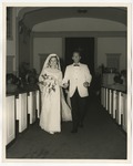 Bride and groom walking down the aisle by Lonnie W. Fleming Sr.