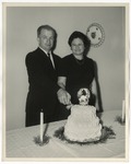 Photo of a couple cutting an anniversary cake by Lonnie W. Fleming Sr.