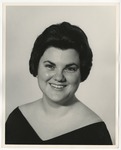 Photo of a woman wearing a black v neck top by Lonnie W. Fleming Sr.