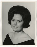 Photo of a woman wearing a black v neck top by Lonnie W. Fleming Sr.