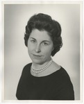 Photo of a woman wearing a black top and pearls by Lonnie W. Fleming Sr.