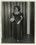 Photo of a woman in a dark colored dress by Lonnie W. Fleming Sr.