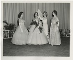 Photo of a girl being crowned pageant queen by Lonnie W. Fleming Sr.