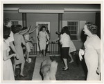 Photo of the bride and groom having rice thrown on them as they leave for their honeymoon by Lonnie W. Fleming Sr.