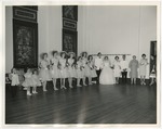 Photo of the bridesmaids, flower girls, bride and groom in the Fellowship Hall by Lonnie W. Fleming Sr.