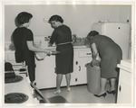 Photo of ladies cleaning the plates used at the wedding reception by Lonnie W. Fleming Sr.