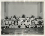 Photo of the wedding party at the front of the First United Methodist Church by Lonnie W. Fleming Sr.
