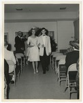 Photo of a bride and groom walking leaving their wedding ceremony by Lonnie W. Fleming Sr.