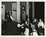 Photo of the bride throwing her bouquet by Lonnie W. Fleming Sr.