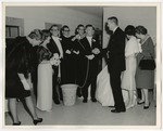 Photo of the groom having a chain tied to his neck by Lonnie W. Fleming Sr.