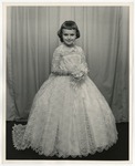 Photo of a young girl in a white dress by Lonnie W. Fleming Sr.