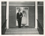Photo of the bride and groom on a porch by Lonnie W. Fleming Sr.