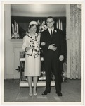 Photo of a bride and groom standing in front of a fireplace by Lonnie W. Fleming Sr.