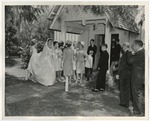 Photo of a bride in her wedding dress outside of St by Lonnie W. Fleming Sr.