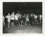 Photo of Conway High School students standing together inside of what appears to be a tobacco warehouse by Lonnie W. Fleming Sr.