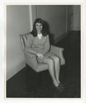 Photo of a girl sitting in a chair in the hallway by Lonnie W. Fleming Sr.