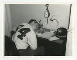 Photo of boy falling asleep at (presumably) his desk by Lonnie W. Fleming Sr.