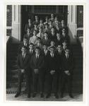 Photo of a group of gentlemen in suits grouped and lined on the front steps of Conway High School by Lonnie W. Fleming Sr.