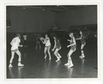 A photo of Conway High School girls playing basketball in the Conway High School gymnasium by Lonnie W. Fleming Sr.