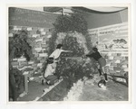 A photo of three girls decorating a set by Lonnie W. Fleming Sr.