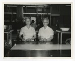 A picture of two women in the Conway High School cafeteria kitchen by Lonnie W. Fleming Sr.