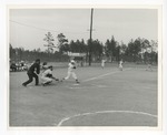 A photo of a baseball player swinging his bat at a baseball game by Lonnie W. Fleming Sr.