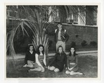 Four girls and a guy posing for a picture by a palm by Lonnie W. Fleming Sr.