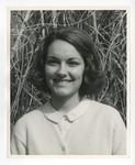 A photo of a girl smiling with Pampus Grass behind her by Lonnie W. Fleming Sr.