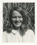 A photo of a girl smiling with Pampus Grass behind her by Lonnie W. Fleming Sr.