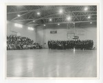 A photo of a choir singing in the Conway High School gymnasium by Lonnie W. Fleming Sr.