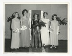 A photo of five girls posing for a photo in dresses by Lonnie W. Fleming Sr.