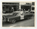 A photo of two ladies in a Cadillac by Lonnie W. Fleming Sr.