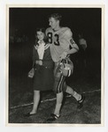 A photo of a Conway High School football player and a girl walking together by Lonnie W. Fleming Sr.