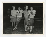 A photo of two Conway High School football players and two female students posing for a picture by Lonnie W. Fleming Sr.