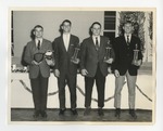 A photo of four young male students standing with trophies by Lonnie W. Fleming Sr.