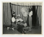 A photo of two girls and a boy pretending to be Arabian by Lonnie W. Fleming Sr.