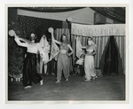 A photo of three girls dancing in middle-eastern attire by Lonnie W. Fleming Sr.