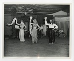 A photo of three girls dancing in middle-eastern attire by Lonnie W. Fleming Sr.